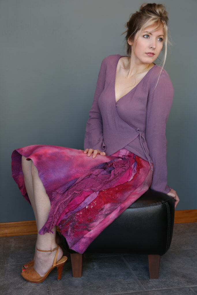 Ashley wearing a custom wool fiber art skirt designed and created by Natasha Lehrer Lewis